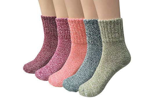 Five multi-colored wool socks.